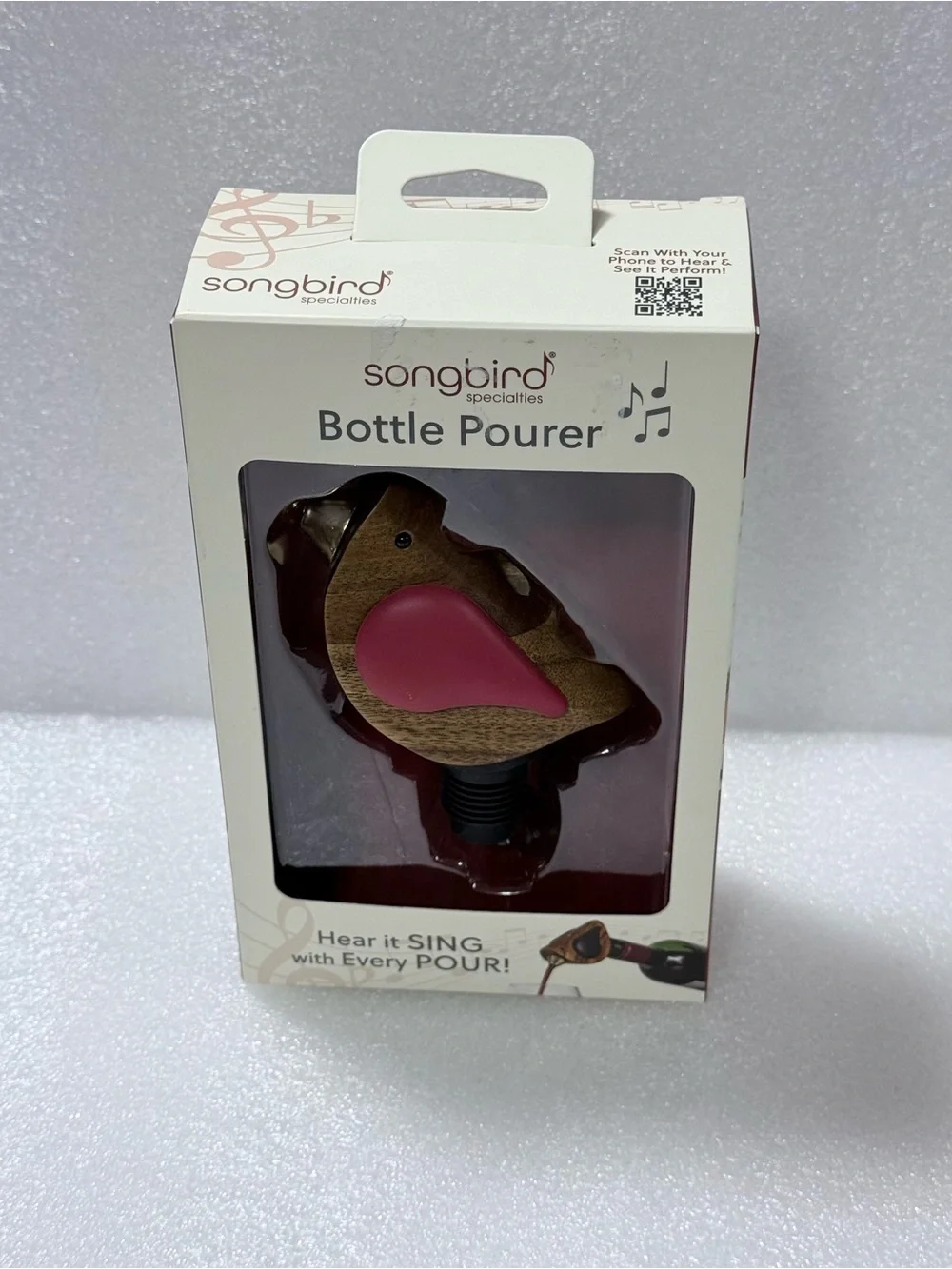 The Songbird Specialties red-winged bird-shaped bottle pourer